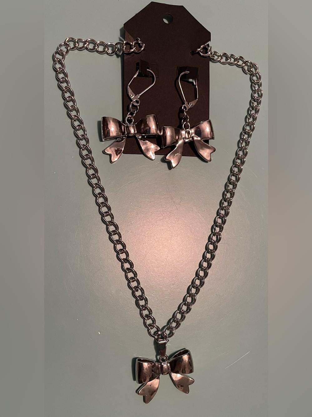 Beautiful Bow Pendant Necklace and Earring Set - Silver Tone